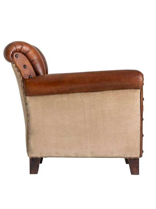 Fauteuil vintage cuir vieilli